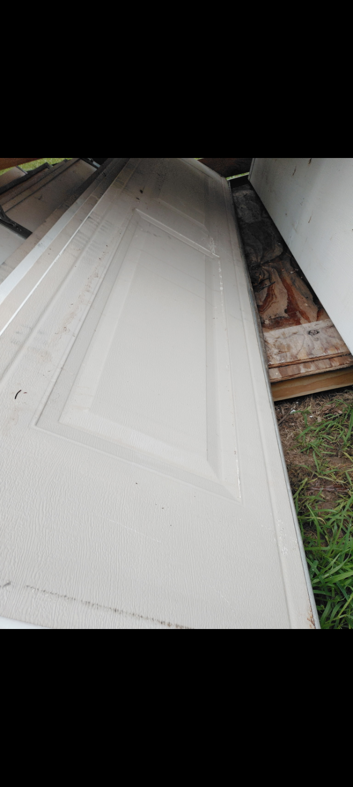 Garage door panel repair