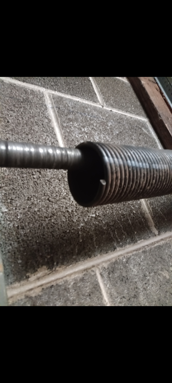 Garage door torsion spring